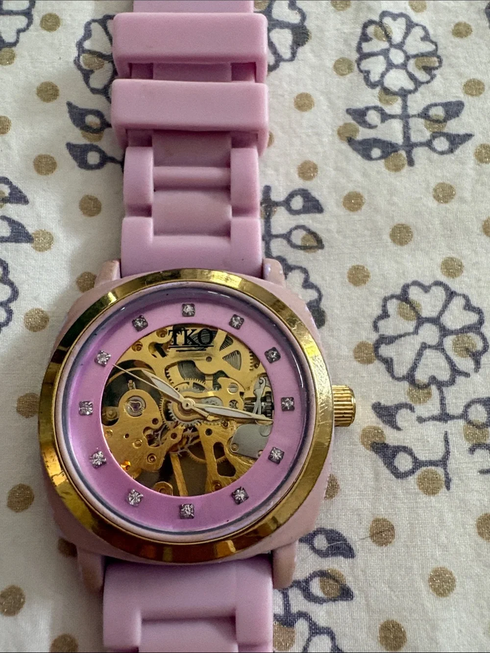 TKO Pink and Gold Skeleton Dial Watch with Crystal Markers